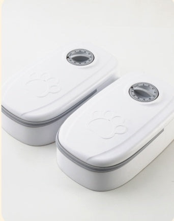 Automatic Pet Feeder & Water Dispenser in white plastic with transparent containers for food and water, suitable for pet